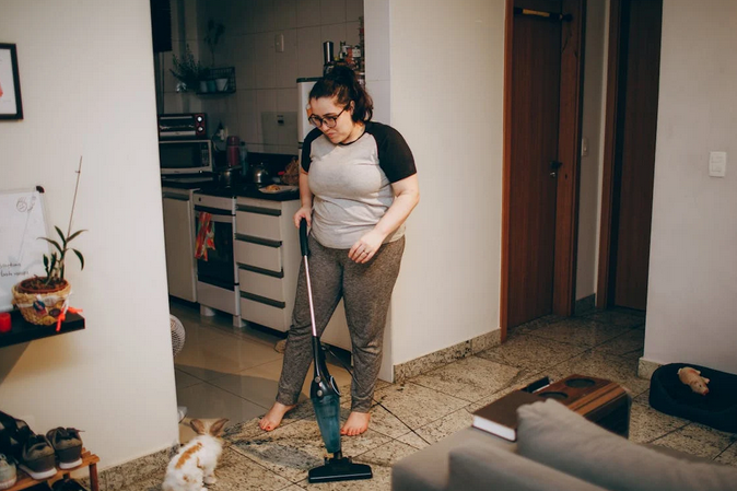 vacuuming floor